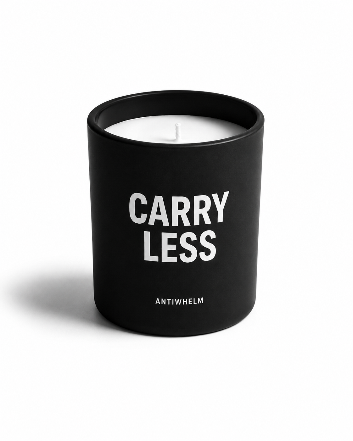 Black Antiwhelm candle reading Carry Less